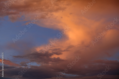 Sky with clouds at sunset. Beautiful background for text. 