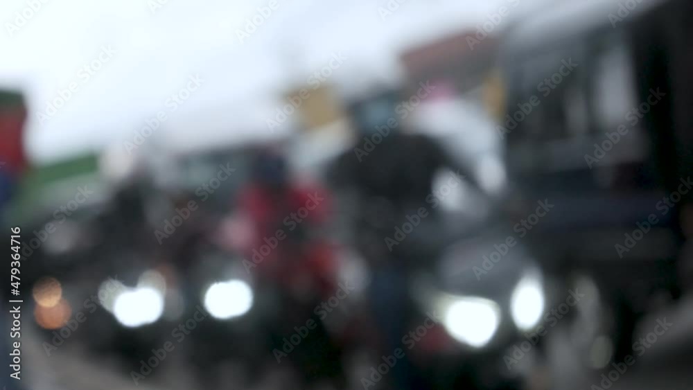 Traffic lights on the street. Blurred bokeh defocused effect light Traffic lights on the street. Blurred bokeh defocused effect light