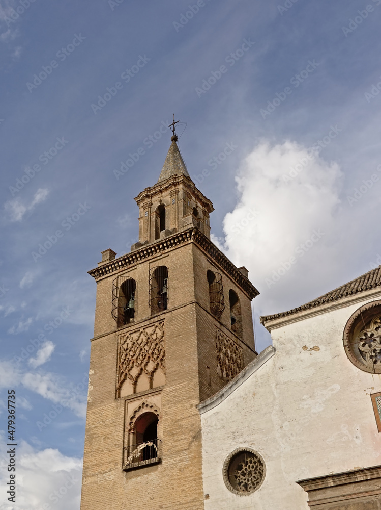 Bell tower of a roman catholic church in Seville, Spain