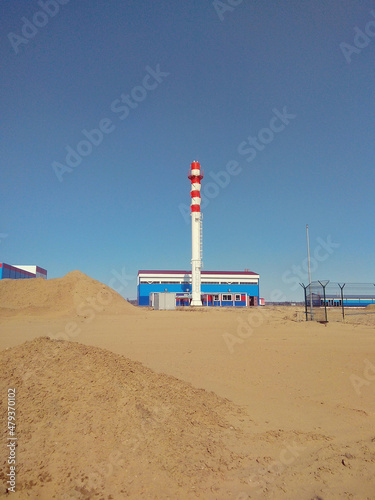 boiler house building with chimney against the sky