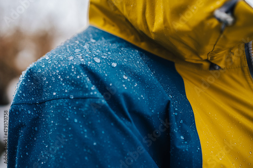 Detail photo of wateproof jacket with water droplets on it. Jacket using the gore-tex technology. photo
