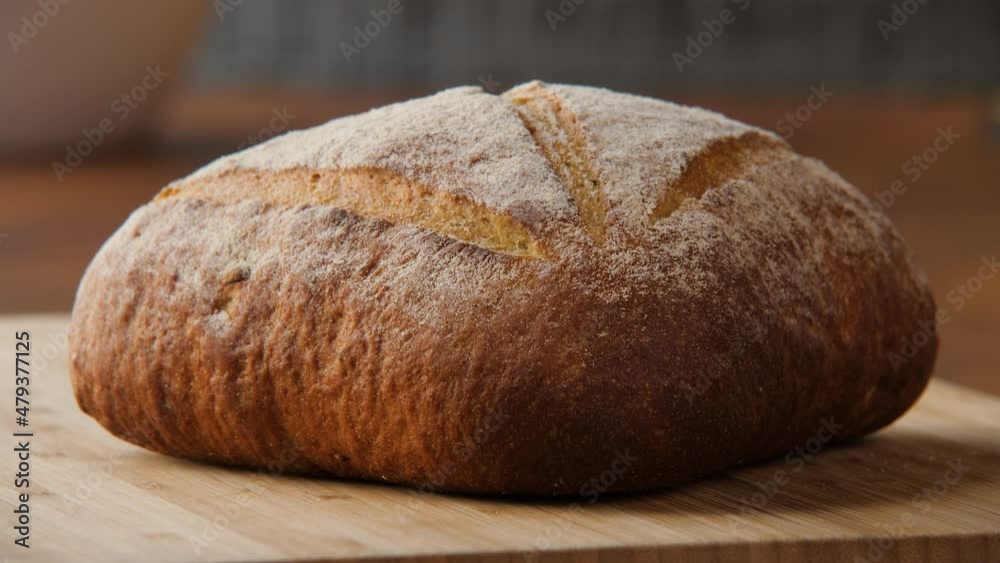 Close-up of freshly baked homemade bread in the shape of a triangle Close-up of freshly baked homemade bread in the shape of a triangle