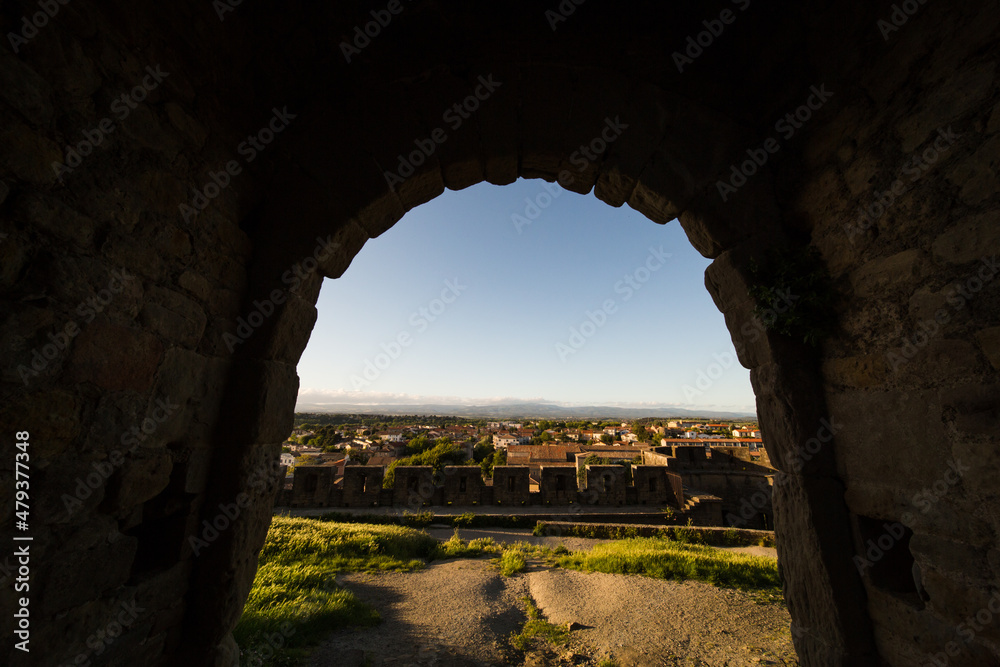 View of Carcassonne City in France from its Medieval Citadel (Cité Médiévale) Northern Entry Porch at Sunset