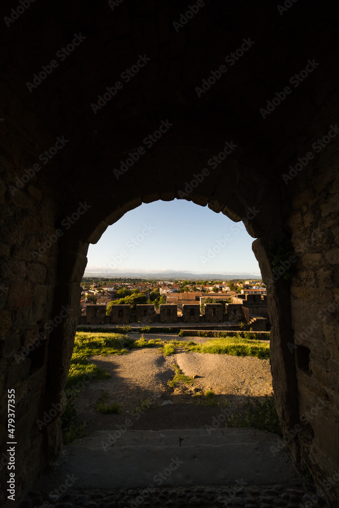 View of Carcassonne City in France from its Medieval Citadel (Cité Médiévale) Northern Entry Porch at Sunset
