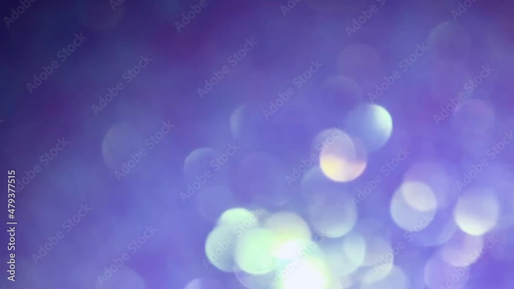 Christmas purple bokeh background lights sparkle Christmas background with abstract purple green light and glitter holiday. lights, footage.