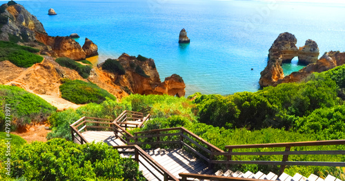 Algarve in Portugal at Camilo beach in Lagos - beautiful panorama of cliffs and the turquoise Atlantic ocean