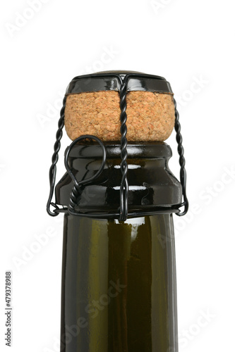 Cork of a corked champagne bottle, close-up. Isolated on a white background.