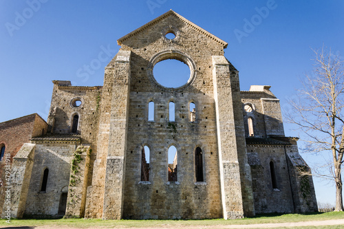 San Galgano, Chiusdino, Italy. January 2021. Stunning Tuscan landscape with the dilapidated and roofless abbey of San Galgano. photo