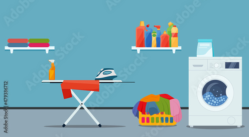 Laundry room interior with washing machine, ironer, iron, clothes and cleaning products.