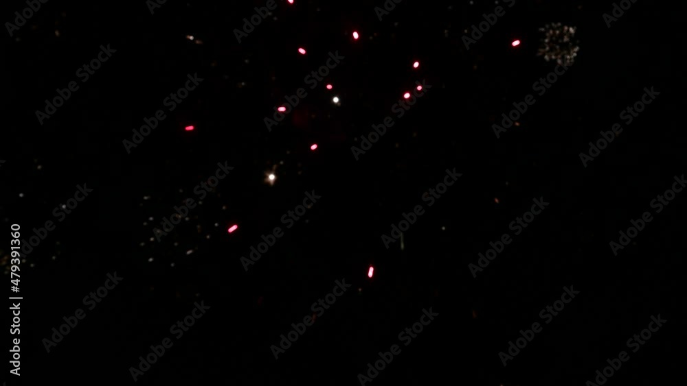 Christmas fireworks at night. 4k video abstract background. Copy space
