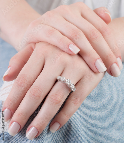 Diamond jewelry. Diamond rings on woman finger
