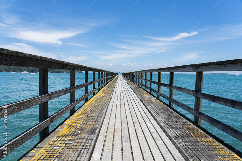 Long leading lines of never ending jetty on Motuihe Island , Auckland New zealand.