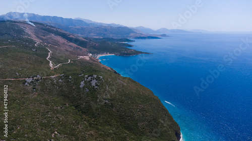 Typical Albanian landscape on the Adriatic shore with mountains. Sunny morning in Albania  Europe. Traveling concept background.