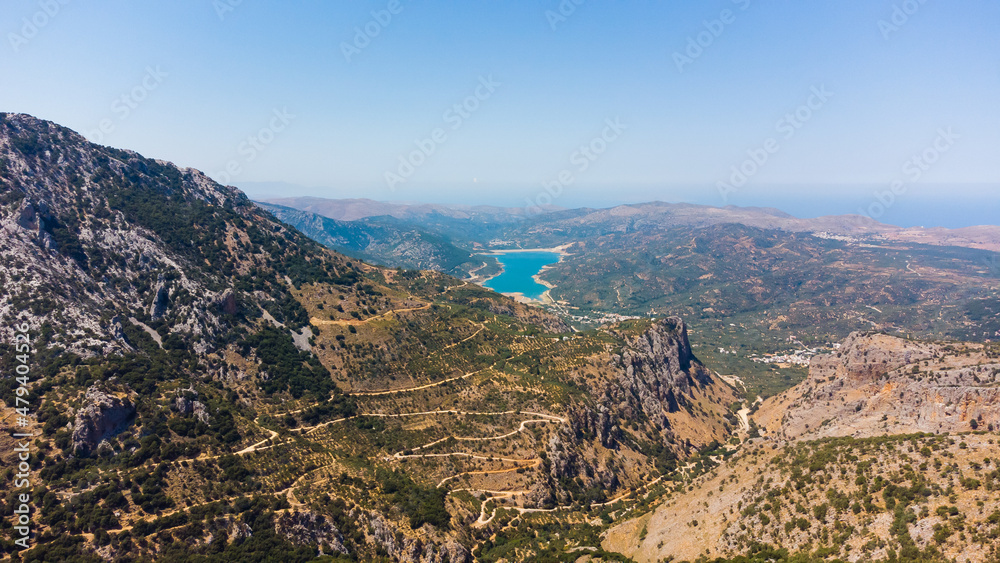 Naklejka premium Landscape of high hills in Crete on the background of the sky