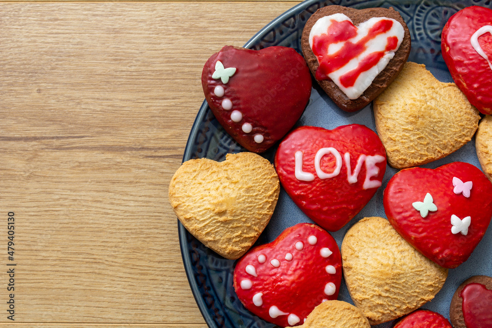 cookies in the form of hearts for Valentine's day. love. Decorated heart shaped cookies, closeup. Valentine's day treat cookies in the form of hearts for Valentine's day. love. Decorated heart shaped cookies, closeup. Valentine's day treat