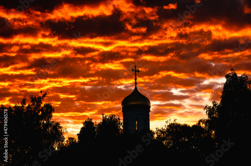 church on the background of a red sunset, a symbol of religion
