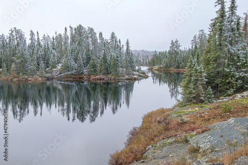 Fototapeta Naklejka Na Ścianę i Meble -  Roadside Lake in Lake Superior Provincial Park, Northwestern Ontario, Canada - Early snowfall
