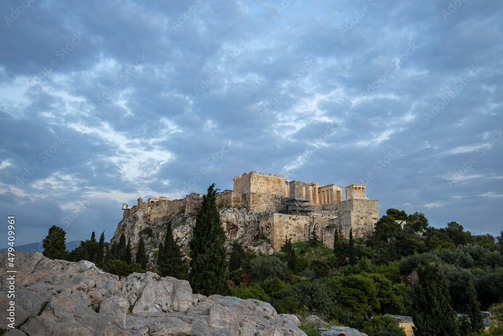 View of the city of Athens November 17, 2021: Evening landscape, blue sky with clouds, soft light. Picturesque view from the hill to the old town.