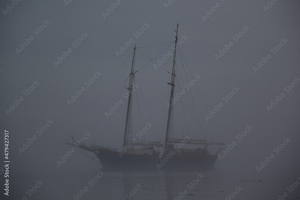 Ship on a foggy morning, ghost ship in fog