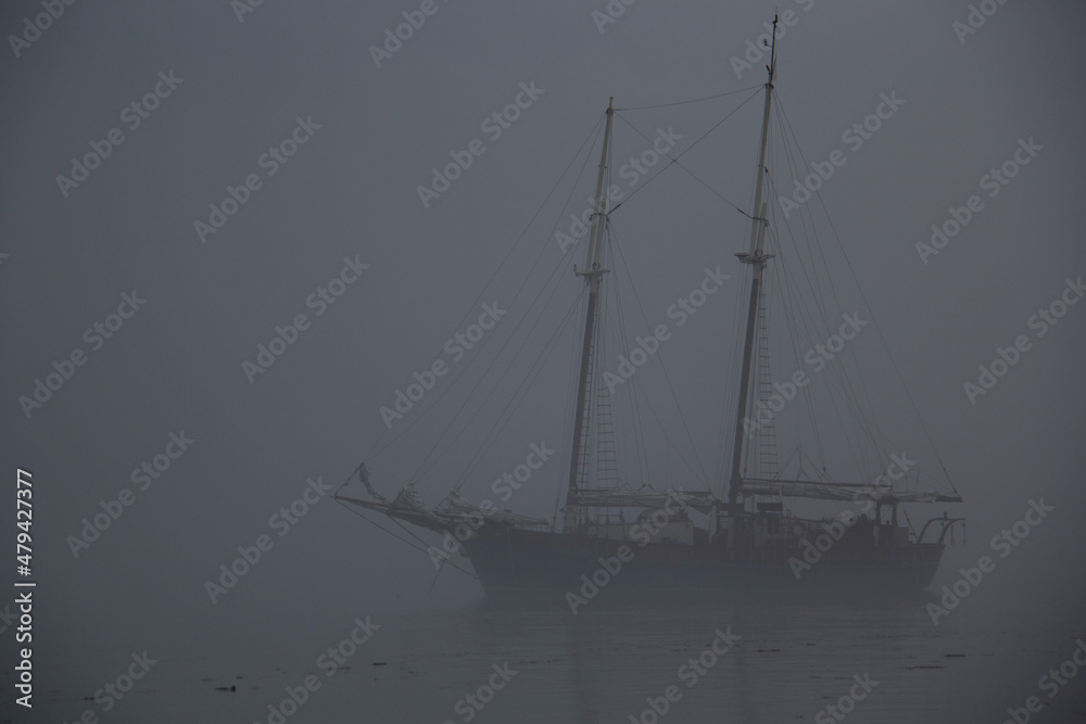 Ship on a foggy morning, ghost ship in fog
