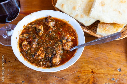 Stewed veal with tomato and herbs, typical Georgian dish Chashushuli photo