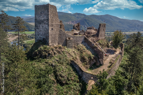 Stampa su Tela Aerial view of under restoration medieval Reviste castle above the Hron (Garam)