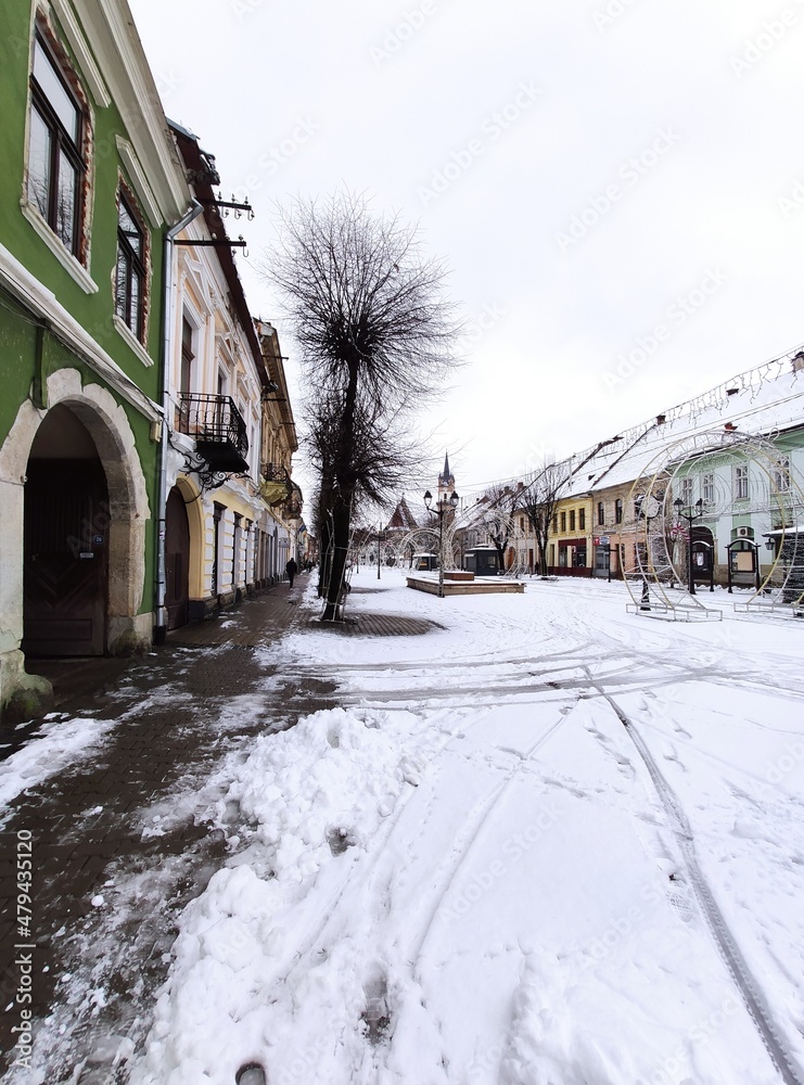 The central area of Bistrita in January 2022, and the Evangelical Church in the background 