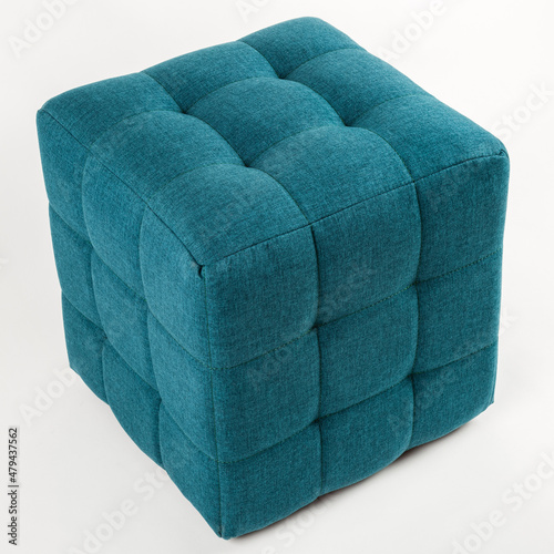 Soft blue pouf on a white background. photo