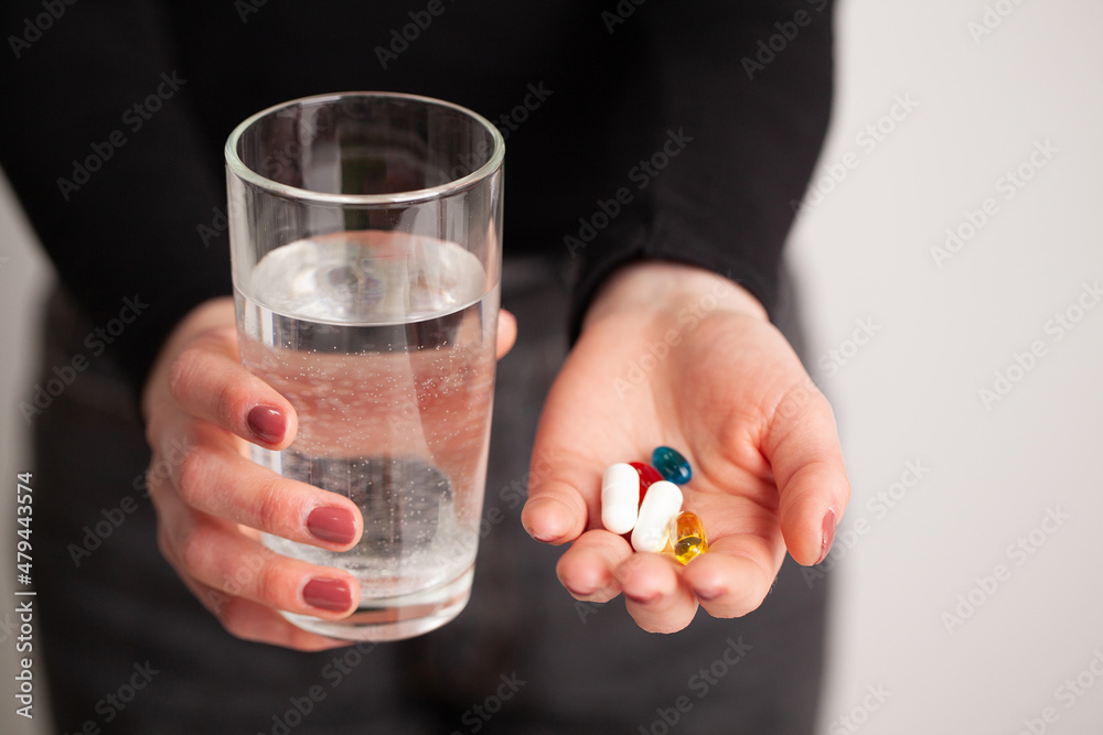 Woman doctor nutritionist hands in with omega Woman doctor nutritionist hands in with omega