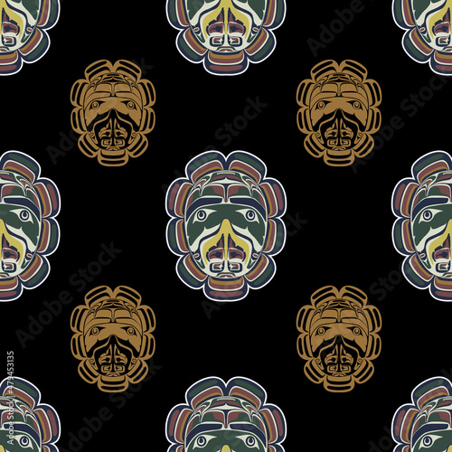 Seamless ethnic pattern with Native American masks of Kwakiutl Indians. photo