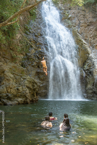 Enjoying the cascades at Montezuma Waterfall, Puntarenas, Costa Rica 