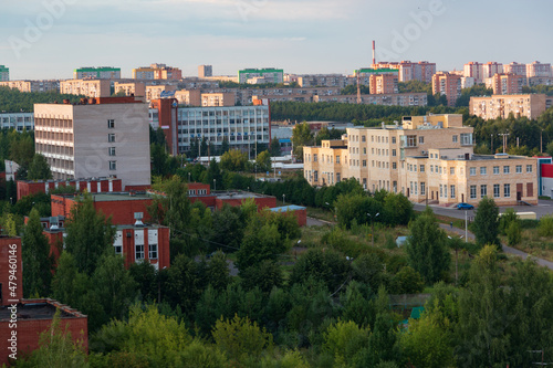 provincial city of Russia with high-rise buildings in the evening