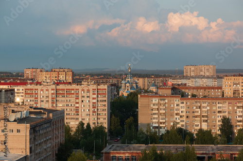 provincial city of Russia with high-rise buildings in the evening