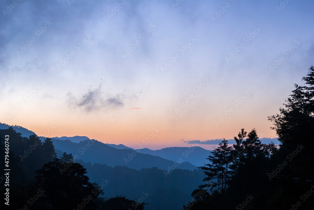 Sunrise in rural mountainous area of ​​Guatemala, a forest space source of oxygen and universal inspiration.