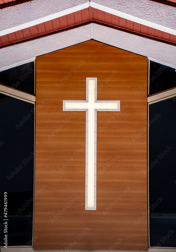 Religious holy cross on wooden background