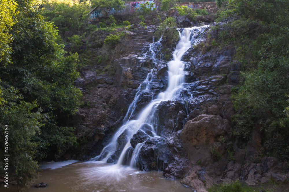 Obraz premium Waterfall with clear water in Los Filtros Viejos Park at Morelia, Michoacan, Mexico. Long exposure photography