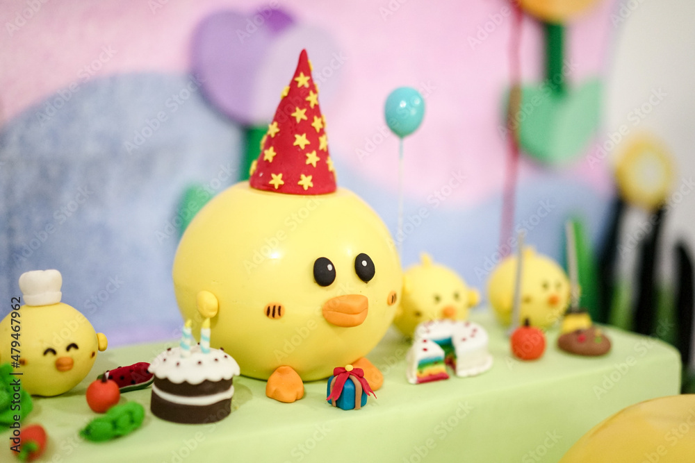 Funny yellow ducks decorated cakes for a baby shower birthday