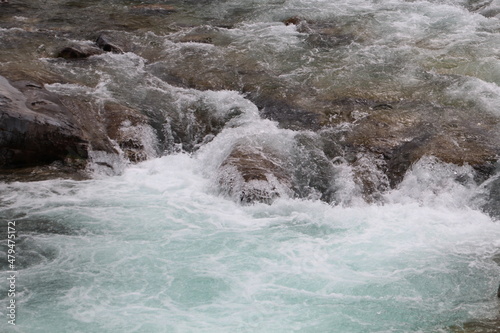 water flowing over rocks, Kananaskis Country, Alberta