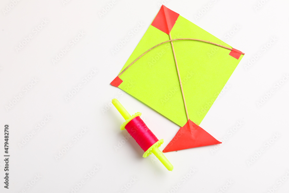 Colorful paper kites and string , Makar Sankranti festival Concept