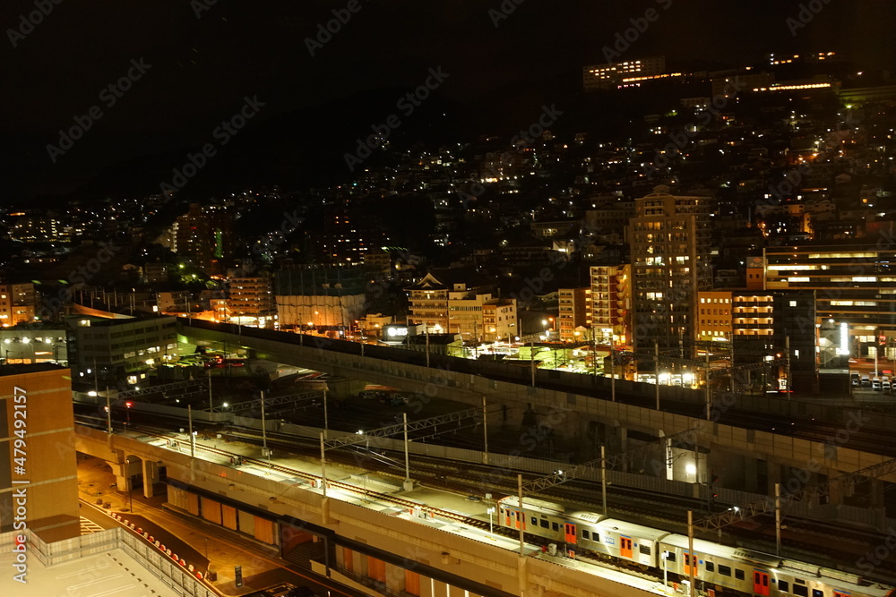 Nagasaki Station and Cityscape of Nagasaki at Night in Nagasaki, Japan - 日本 長崎県 長崎駅 駅前 街並みの夜景	