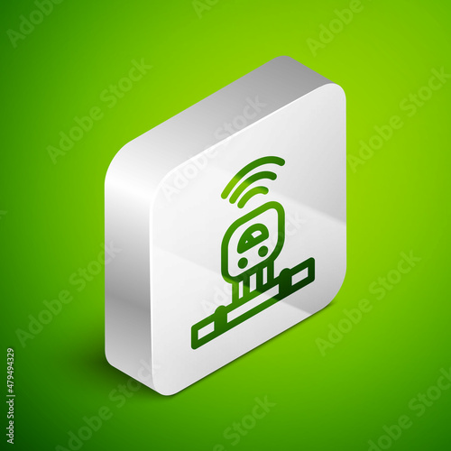 Isometric line Smart sensor system icon isolated on green background. Internet of things concept with wireless connection. Silver square button. Vector