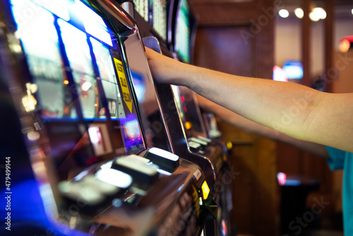 People Playing Casino Slot Machines Close Up