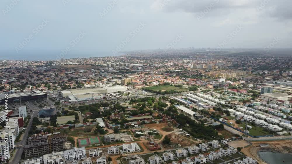 Talatona Luanda Angola - 12 20 2021: Aerial drone footage of Talatona city, residential area with condominiums with luxury houses and office buildings, metropolitan area of Luanda in Angola Talatona Luanda Angola - 12 20 2021: Aerial drone footage of Talatona city, residential area with condominiums with luxury houses and office buildings, metropolitan area of Luanda in Angola