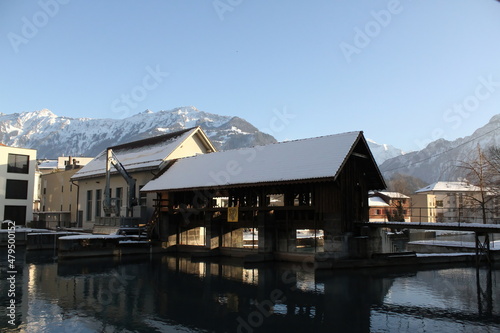 Covered Bridge in Aare River, Interlaken, Switzerland, in Winter.