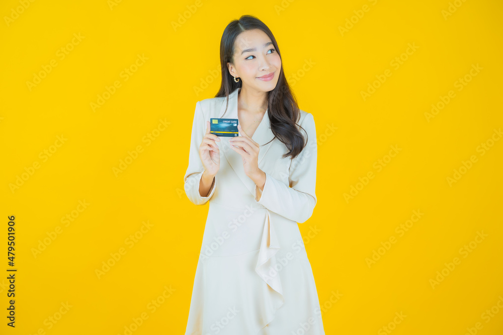 Portrait beautiful young asian woman smile with credit card