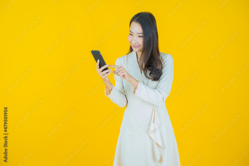 Portrait beautiful young asian woman smile with smart mobile phone Portrait beautiful young asian woman smile with smart mobile phone