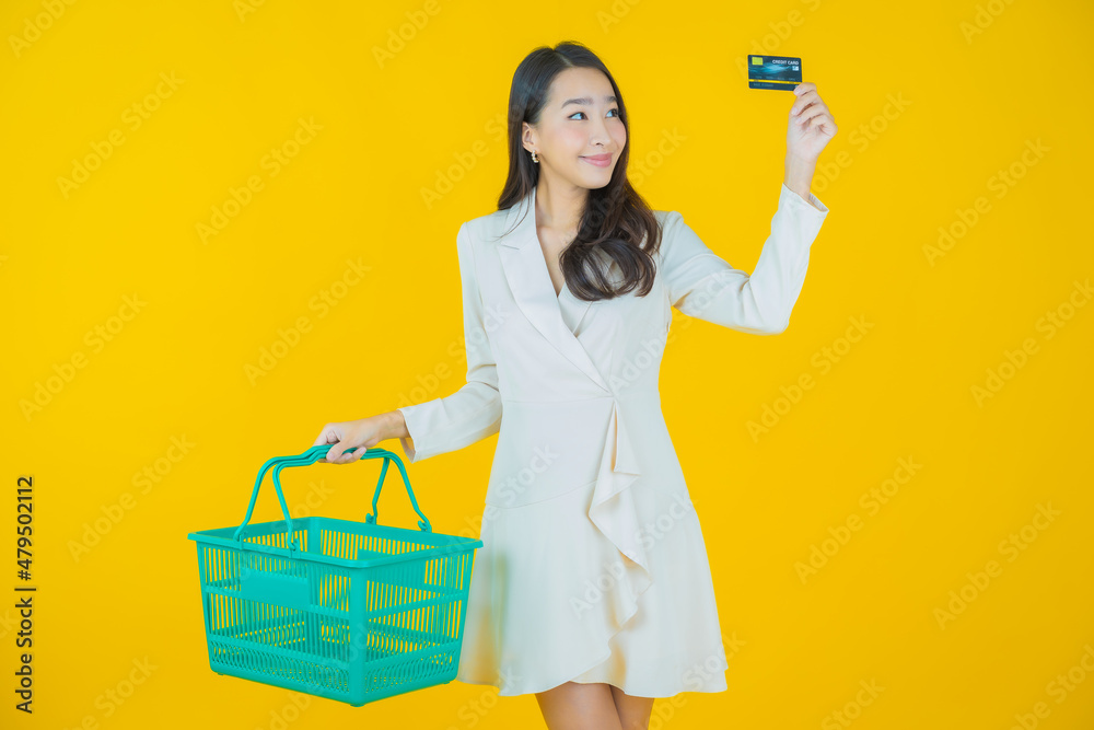 Portrait beautiful young asian woman smile with grocery basket Portrait beautiful young asian woman smile with grocery basket