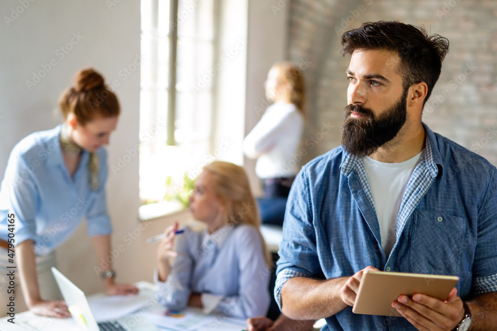 Group of multiethnic business people working at the office. Startup finance teamwork concept Group of multiethnic business people working at the office. Startup finance teamwork concept