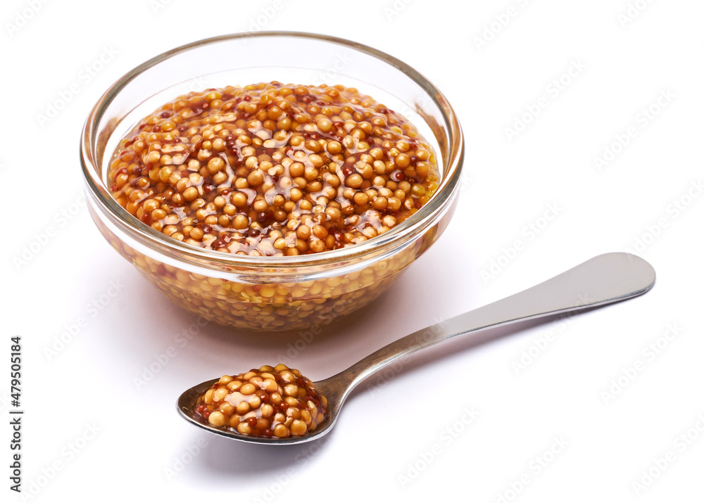 Classic Dijon mustard sauce in glass bowl isolated on white background Classic Dijon mustard sauce in glass bowl isolated on white background