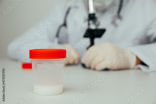 Doctor analyzing semen samples in laboratory